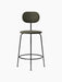 Front view of the Afteroom Counter Chair Plus, fully upholstered in dark green Fiord fabric with a slender black steel frame.