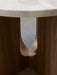 Close-up of the Androgyne Side Table, showing the U-shaped cutout and joinery of the walnut base under the Kunis Breccia top.