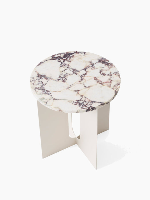 High-angle view of the Androgyne Side Table with a round Calacatta Viola marble top and an ivory powder-coated steel base.