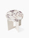 High-angle view of the Androgyne Side Table with a round Calacatta Viola marble top and an ivory powder-coated steel base.