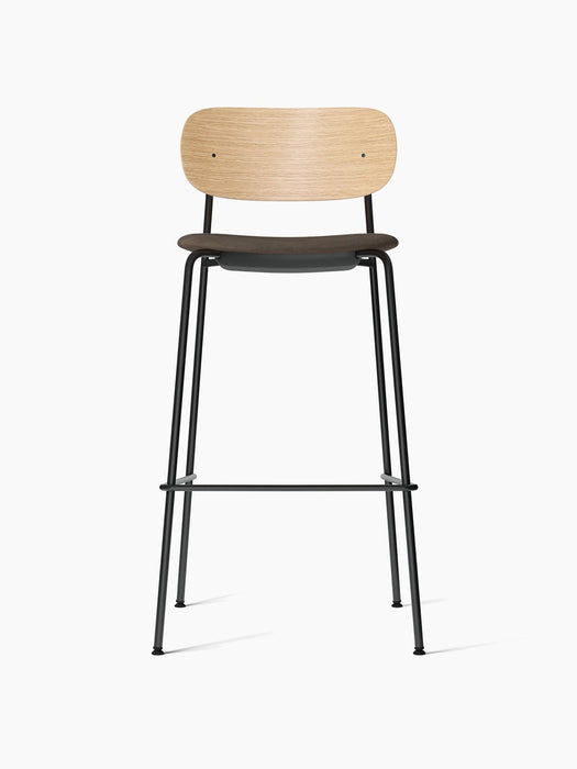 Front view of the Co Bar Chair, Seat Upholstered, with a natural oak backrest, dark fabric seat, and black steel frame.