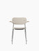 Front view of the Co Dining Chair, fully upholstered in light beige fabric, with natural oak armrests and a chrome frame.