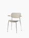 Angled view of the Co Dining Chair, fully upholstered in light beige fabric with natural oak armrests and a chrome frame.