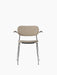 Front view of the Co Dining Chair with armrests, sand upholstery, dark stained oak armrests, and a chrome frame.