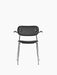 Front view of the Co Dining Chair, fully upholstered in black leather with black oak armrests and sleek, shiny chrome frame.