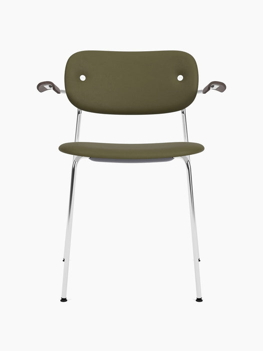 Co Dining Chair with olive green upholstery, dark wood armrests, and a sleek chrome frame against a white background.