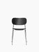 A front view of the Co Dining Chair, featuring a black oak veneer seat and backrest on a slender, polished chrome frame.