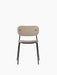 Front view of the Co Dining Chair, fully upholstered in Lupo Sand fabric, with a slim black powder-coated steel frame.