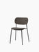 Angled view of the Co Dining Chair, fully upholstered in dark, textured Doppiopanama fabric with a slender black steel frame.