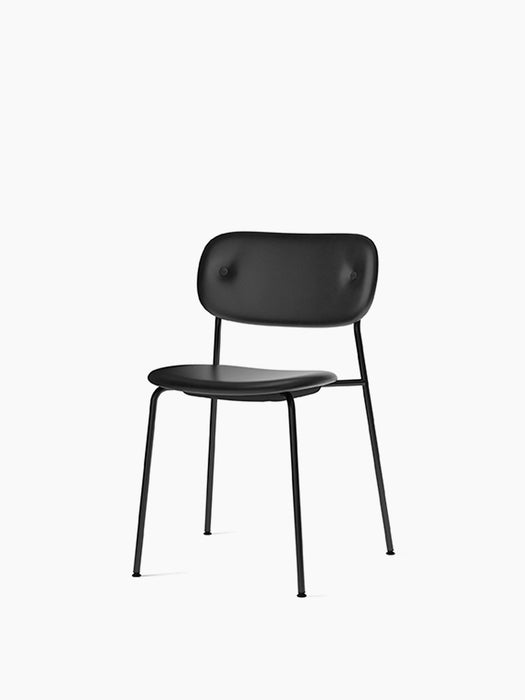 Co Dining Chair fully upholstered in black leather, with a slim black steel frame. Shown at an angle on a plain background.