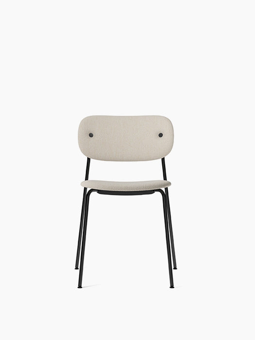 A front view of the Co Dining Chair, fully upholstered seat and back in a light, textured fabric, with a slim black frame.