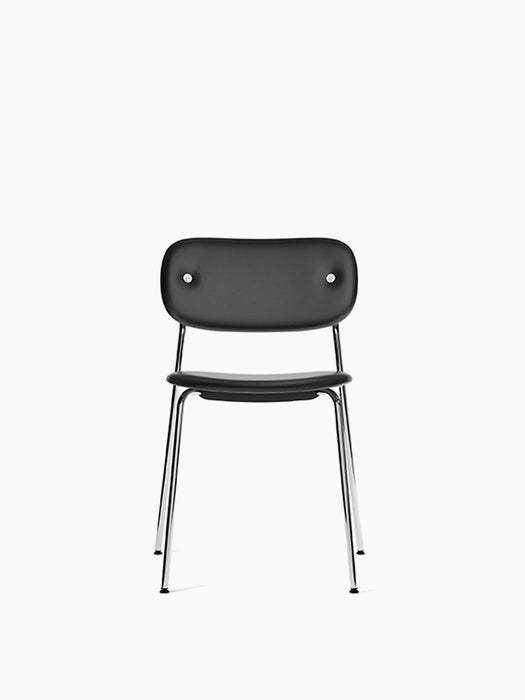 Front view of the Co Dining Chair, fully upholstered in dark Dakar leather, with a slender, shiny chrome frame.
