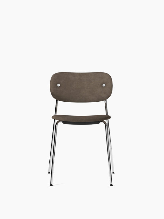 The Co Dining Chair seen from the front. It has a curved, brown upholstered seat and backrest on a slender, chrome frame.