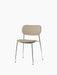 Co Dining Chair with a chrome frame, fully upholstered in a textured, light beige bouclé fabric, shown at an angle.