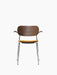 Front view of the Co Dining Chair with a dark stained oak backrest, armrests, an ochre upholstered seat, and a chrome frame.