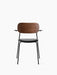 Front view of the Co Dining Chair with armrests. Black steel frame, black upholstered seat, and a smoked oak backrest.