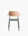 Front view of the Co Dining Chair with a natural oak backrest and armrests, a grey upholstered seat, and a black steel frame.