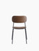 Front view of the Co Dining Chair with a smoked oak veneer seat and backrest, and a slender black powder-coated steel frame.