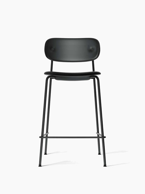 Co Counter Chair, Fully Upholstered, with a black Dakar leather seat and backrest and a slender black steel frame.