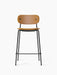 Front view of the Co Counter Chair, Fully Upholstered with a tan leather seat and backrest on a slender, black steel frame.