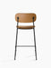 Back view of the Co Counter Chair, Fully Upholstered, in tan leather with a slender black powder-coated steel frame.