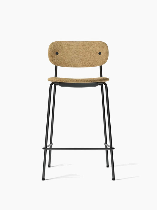 Front view of the Co Counter Chair, Fully Upholstered, with a black steel frame and light brown Audo Bouclé 06 upholstery.