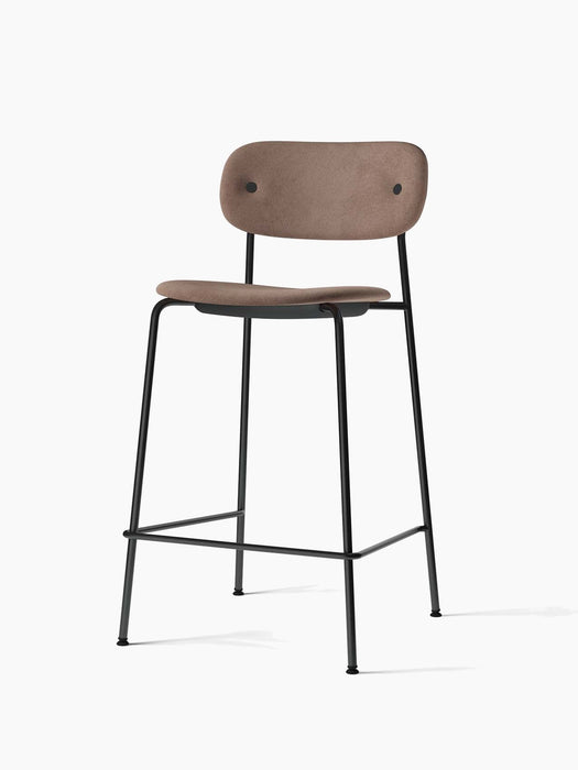 Co Counter Chair, Fully Upholstered, showing its light brown fabric seat and backrest on a black steel frame.