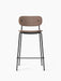 Front view of the Co Counter Chair, Fully Upholstered, with a light brown fabric seat and back on a slim black steel frame.