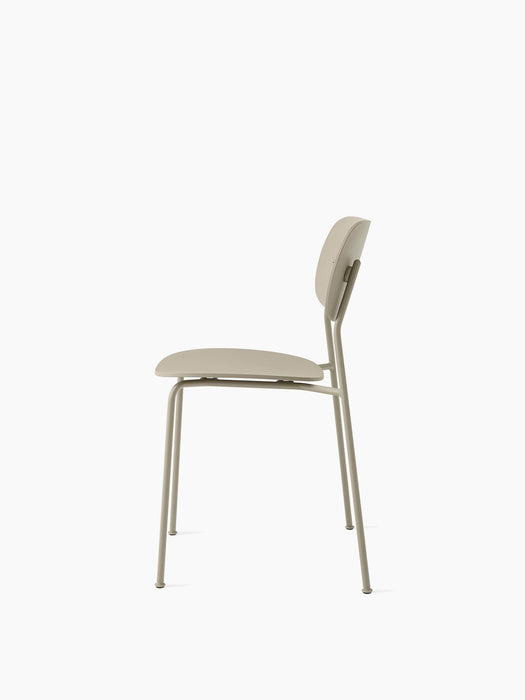 Side view of the Co Dining Chair, Outdoor in ivory without armrests, showing its slim metal frame and recycled plastic seat.