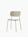 Angled view of the Co Dining Chair, Outdoor, in ivory. The minimalist chair features a slim metal frame and no armrests.