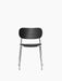 Front view of the Co Dining Chair, featuring a black oak veneer back, a black upholstered seat, and a slender chrome frame.