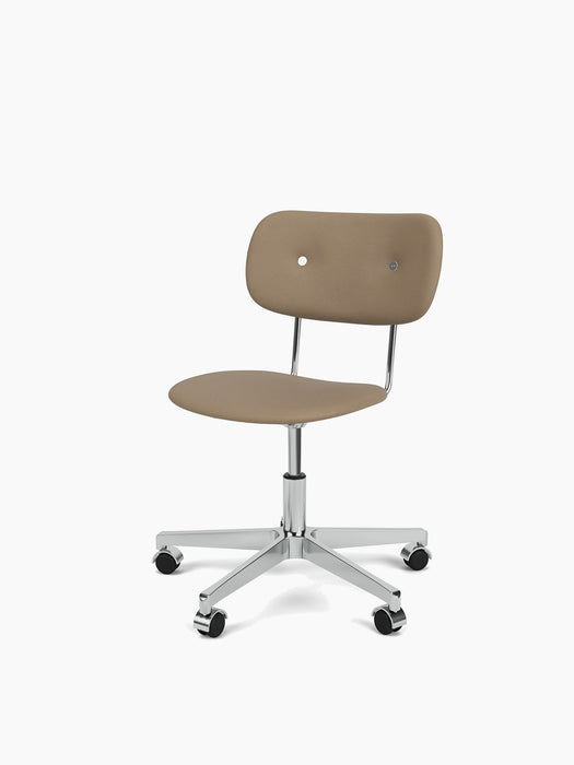 Angled view of the Co Task Chair, upholstered in light brown fabric, with a polished aluminium five-star base and casters.