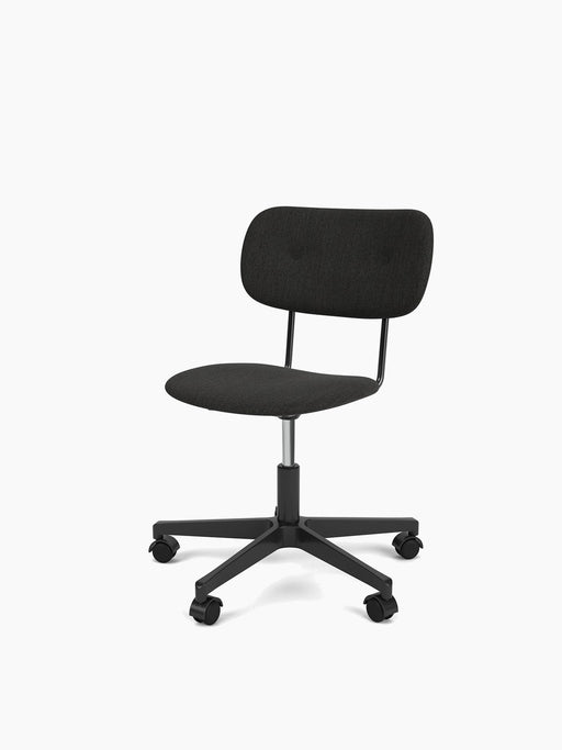 Angled view of the armless Co Task Chair, fully upholstered in dark fabric with a black five-star base and casters.