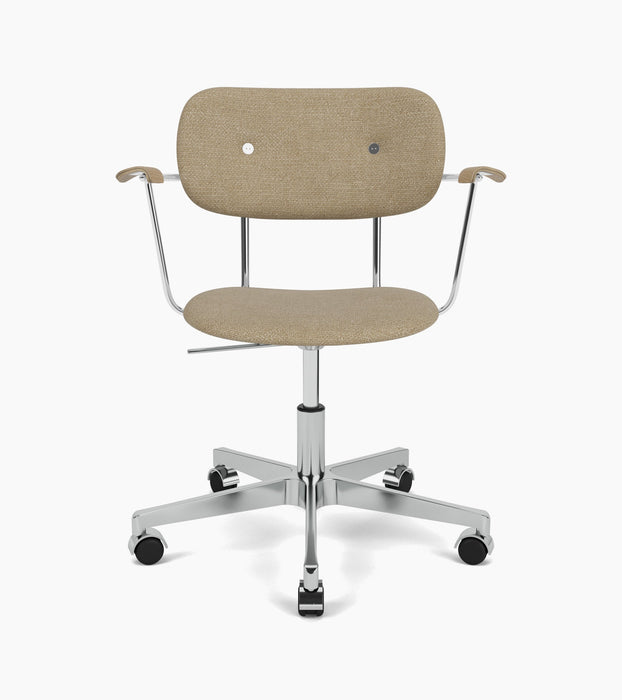 Audo's Co Task Chair, fully upholstered in beige fabric, with armrests and an aluminium five-star base with casters.