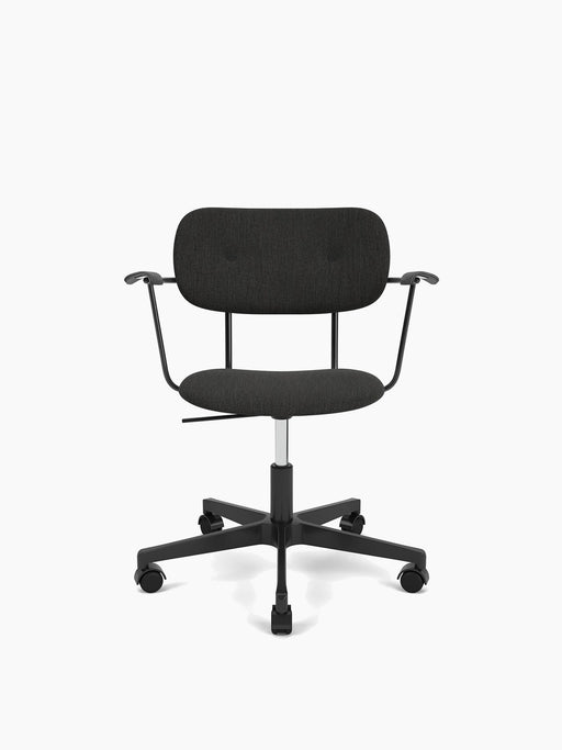 The Co Task Chair, fully upholstered with armrests and a black base with casters, shown against a plain white background.