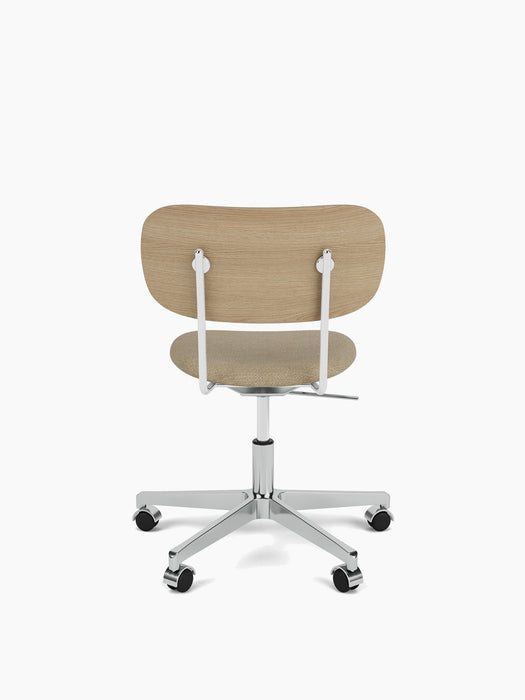 Back view of the Co Task Chair with a natural oak backrest, beige seat, and polished aluminium five-star base on wheels.