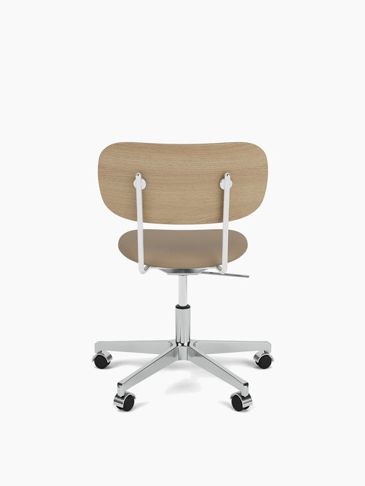 Back view of the Co Task Chair with a natural oak backrest, upholstered seat, and a polished aluminium base on castors.