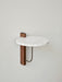 Side view of the Corbel Shelf, with a round white marble top, dark wooden wall mount, and dark metal bracket.