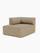Angled view of the Eave Modular Sofa Chaise Longue module, featuring a low, curved backrest and light brown bouclé fabric.