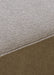 A close-up detail shot of the light brown bouclé fabric on the Eave Modular Sofa, showing the texture and a diagonal seam.