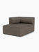 An angled view of the Eave Modular Sofa, 96, Chaise Longue module, with dark textured fabric and a low, curved backrest.