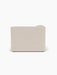 Back view of the Eave Modular Sofa, 96, Chaise Longue, upholstered in a light-coloured fabric against a white background.