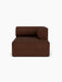 Front view of the Eave Modular Sofa, 96, Chaise Longue in a dark brown bouclé fabric against a white background.