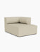 An angled shot of the Eave Modular Sofa, 96, Chaise Longue in a light beige textured fabric against a plain white background.