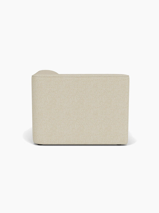 Back view of the Eave Modular Sofa, 96, Chaise Longue in a light-coloured textured fabric, shown on a white background.