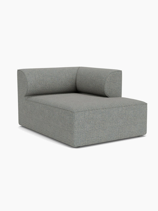 Angled view of the Eave Modular Sofa, 96, Chaise Longue in a textured, grey-blue Safire fabric against a plain background.