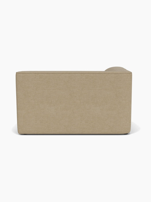 Back view of the Eave Modular Sofa, 96, Corner 144 in light beige Audo Bouclé 02 fabric, shown on a white background.