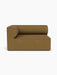 Front view of the Eave Modular Sofa, 96, Corner 144 left module, upholstered in a textured, golden-brown bouclé fabric.