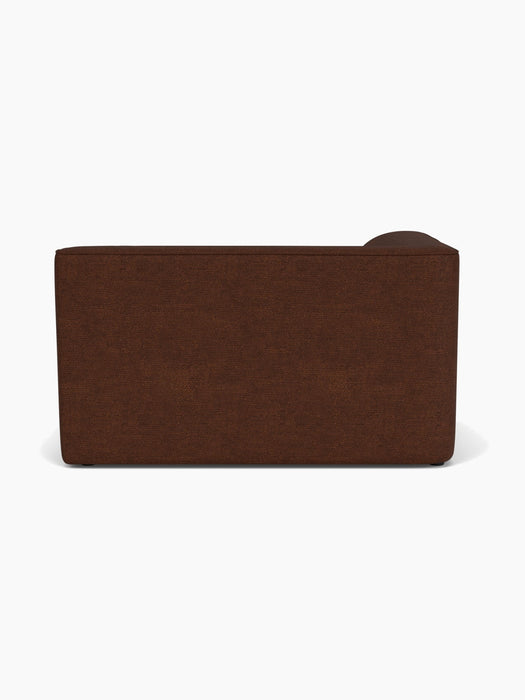 Back view of the Eave Modular Sofa, 96, Corner 144, upholstered in a textured brown bouclé fabric against a white background.