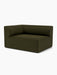 Angled view of the Eave Modular Sofa, 96, Corner 144. This corner section is upholstered in dark green fabric.
